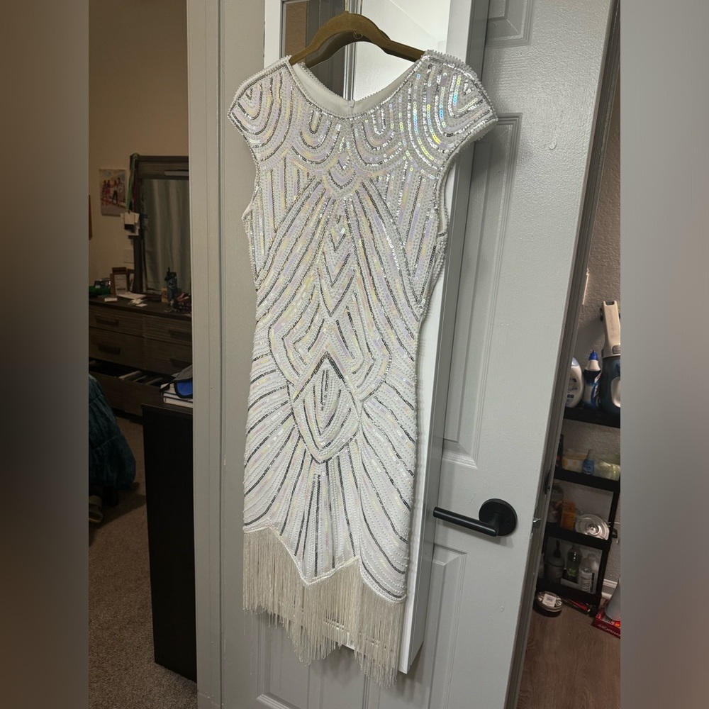 White sequined 1920s style flapper dress